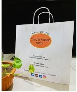 White handle bag printed for Curry & Kabab Bistro