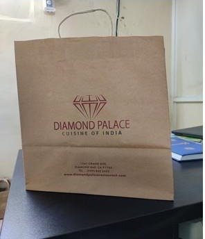 Brown kraft handle bag printed for Diamond Palace Cuisine of India