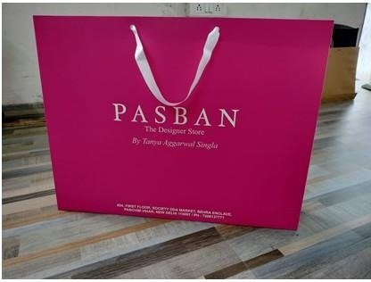 Large magenta premium bag with white ribbon handles for Pasban