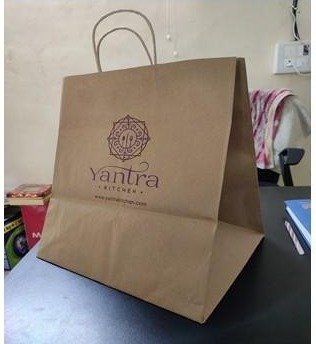 Brown kraft handle bag printed for Yantra Kitchen